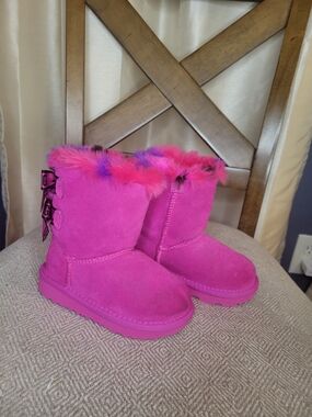 UGG Bailey Bow Plaid Punk Boots.